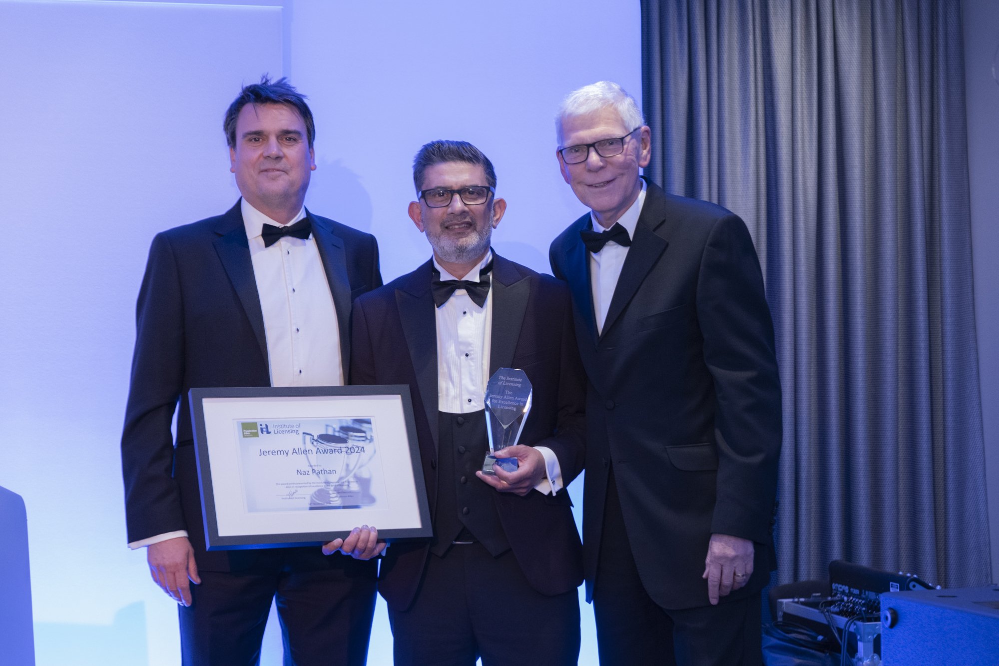 Jeremy Allen Award winner, Naz Pathan (centre), photographed with Partne, Nick Arron (left) and David Lucas (right)